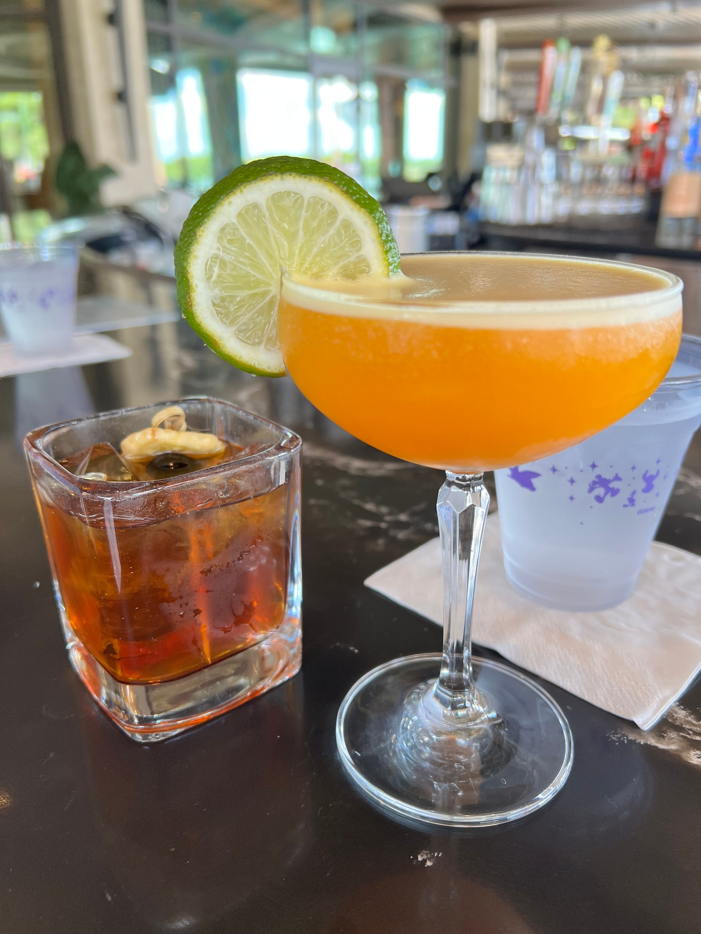 Two cocktails and a glass of water