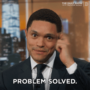 Trevor Noah tapping the side of his head and saying, "Problem solved."