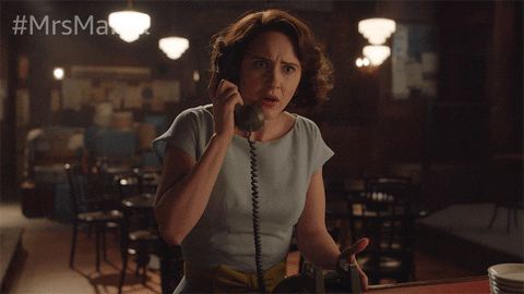 Midge Maisel talking on the phone and exclaiming, "Who are you people?"