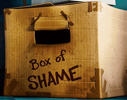 Agnes from Despicable Me peeking out from a cardboard box labelled "Box of Shame".