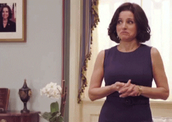Selina Meyer tilting her head and shrugging.